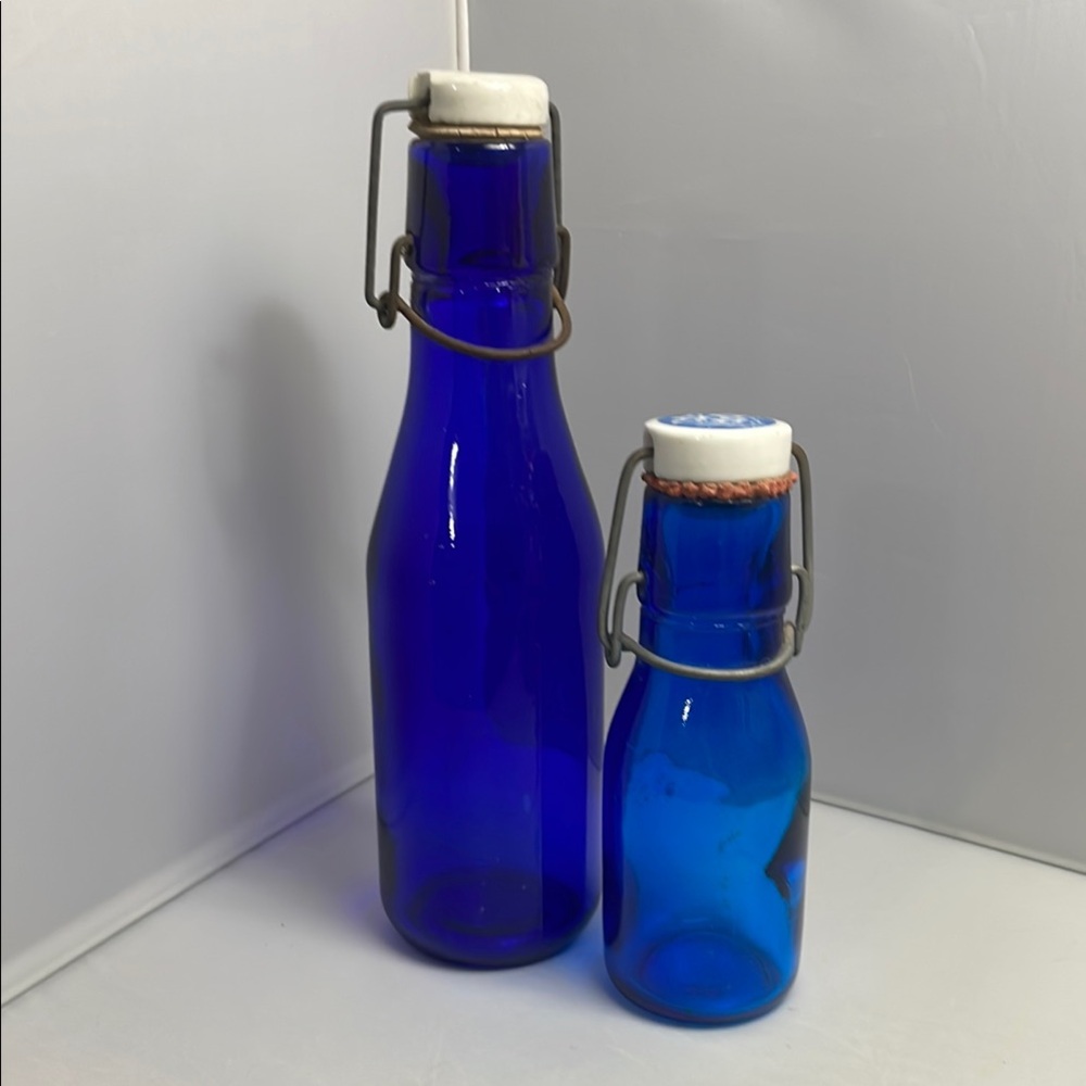 Pair Rustic Blue‎ Glass Swing Top Bottles